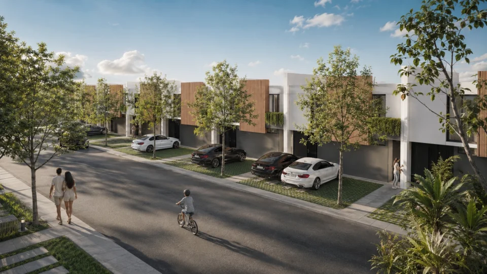Render ilustrativo de viviendas de dos niveles junto a una calle arbolada, proporcionado por Calidad Inmobiliaria